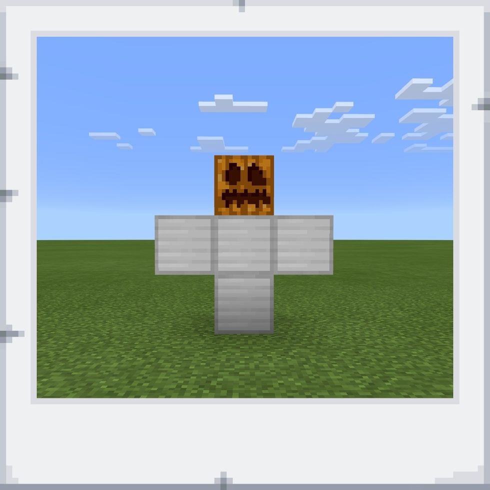 Lastly, place a pumpkin on top of the block you placed in step two.