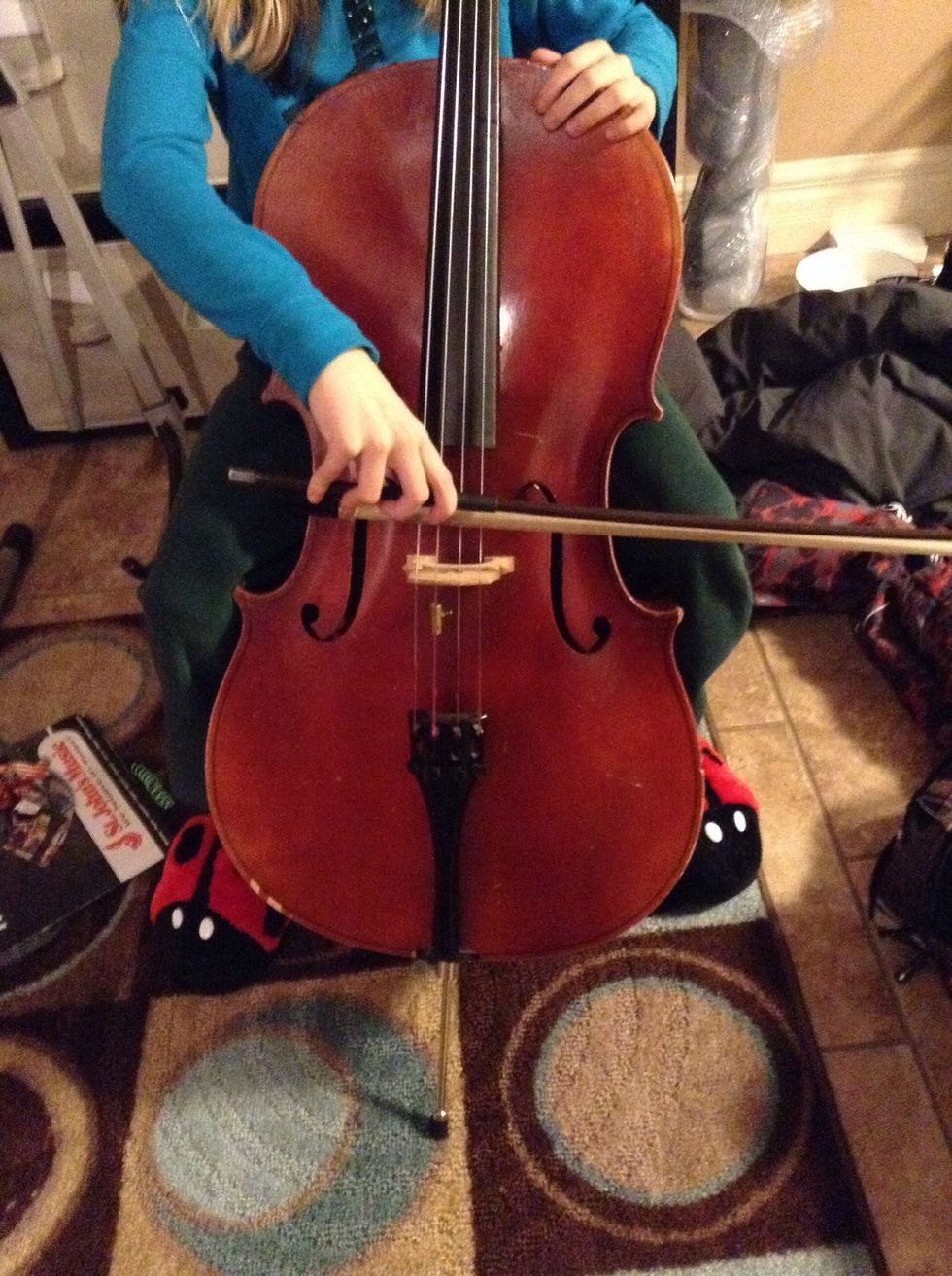 Lastly, place your bow on the first string and pull your bow across the string to play a note. Now you have played an A.