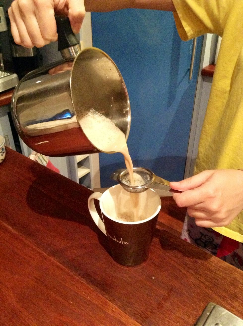 Lastly, pour your chai through a strainer to collect the loose Chai Tea Leaves. Your chai should be lovely and bubbly from aerating :)