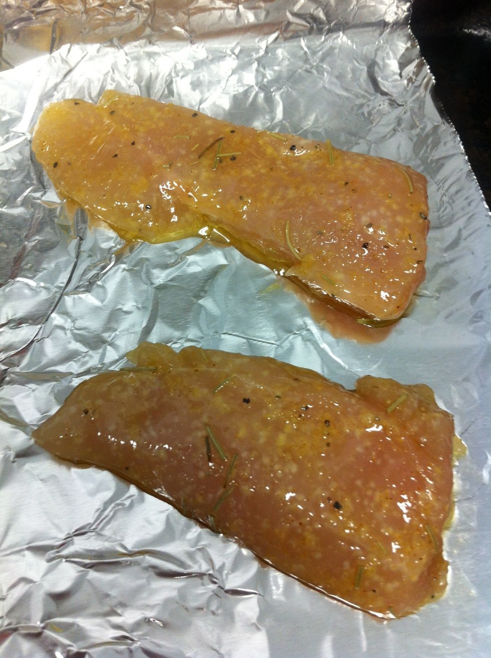 Lastly, sprinkle a bit of rosemary on top. This is how mines look. Bake until well done.