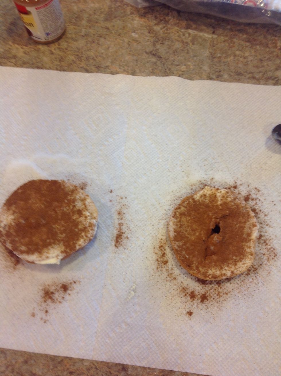 Lastly, sprinkle some cinnamon onto your bagel.