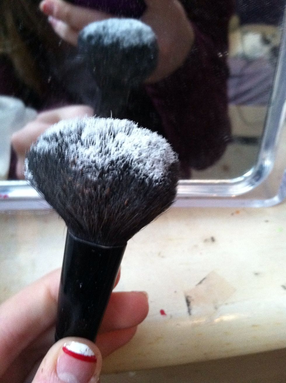 Lastly, take a translucent powder on a powder brush and set your makeup in place (: this step can also aid in any last minute blending that may be needed
