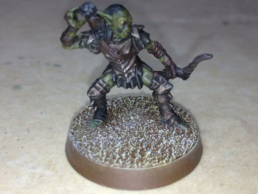 Lastly, to dull the contrast, drybrush the sand with Administratum Grey.