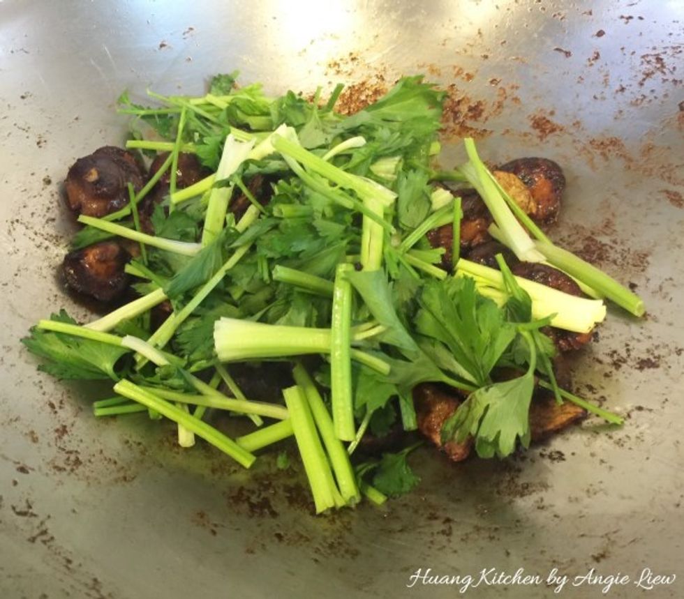 Lastly, toss in the cut coriander leaves.