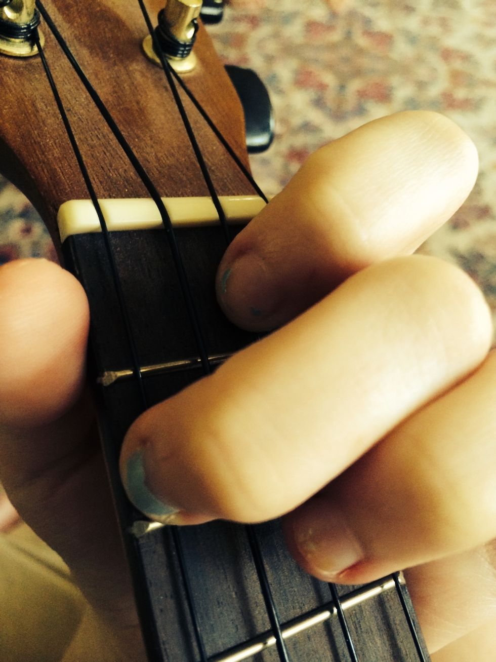 Lastly, we have the F chord. Keep your second finger where it is and place your first finger on the 1st fret of the E string.