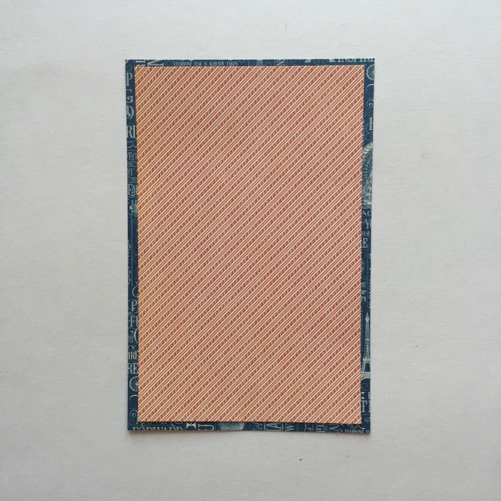 Later an orange patterned sheet from the 6x6 pad that cut at 3 5/8"x 5 5/8"