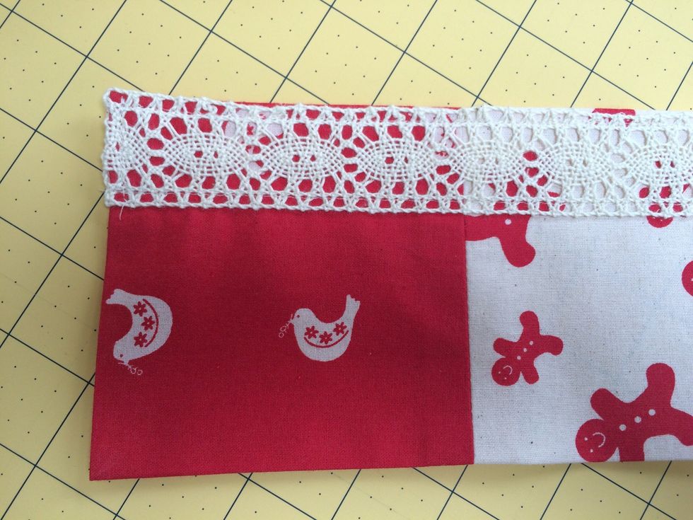 Lay a length of lace across each row of 6 squares and sew in place