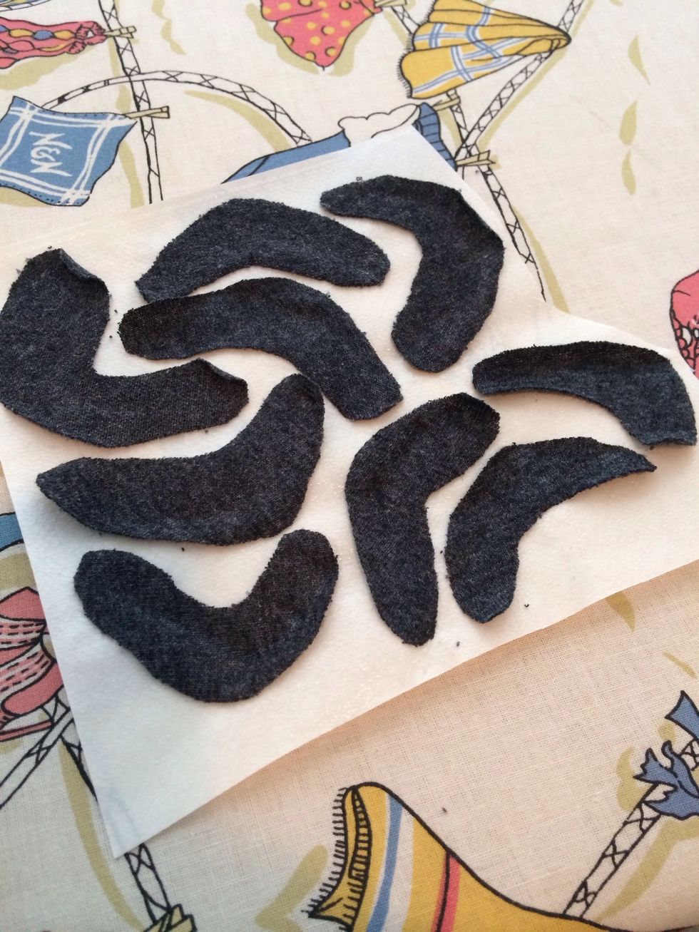 Lay all the rough edged parts on the adhesive paper.