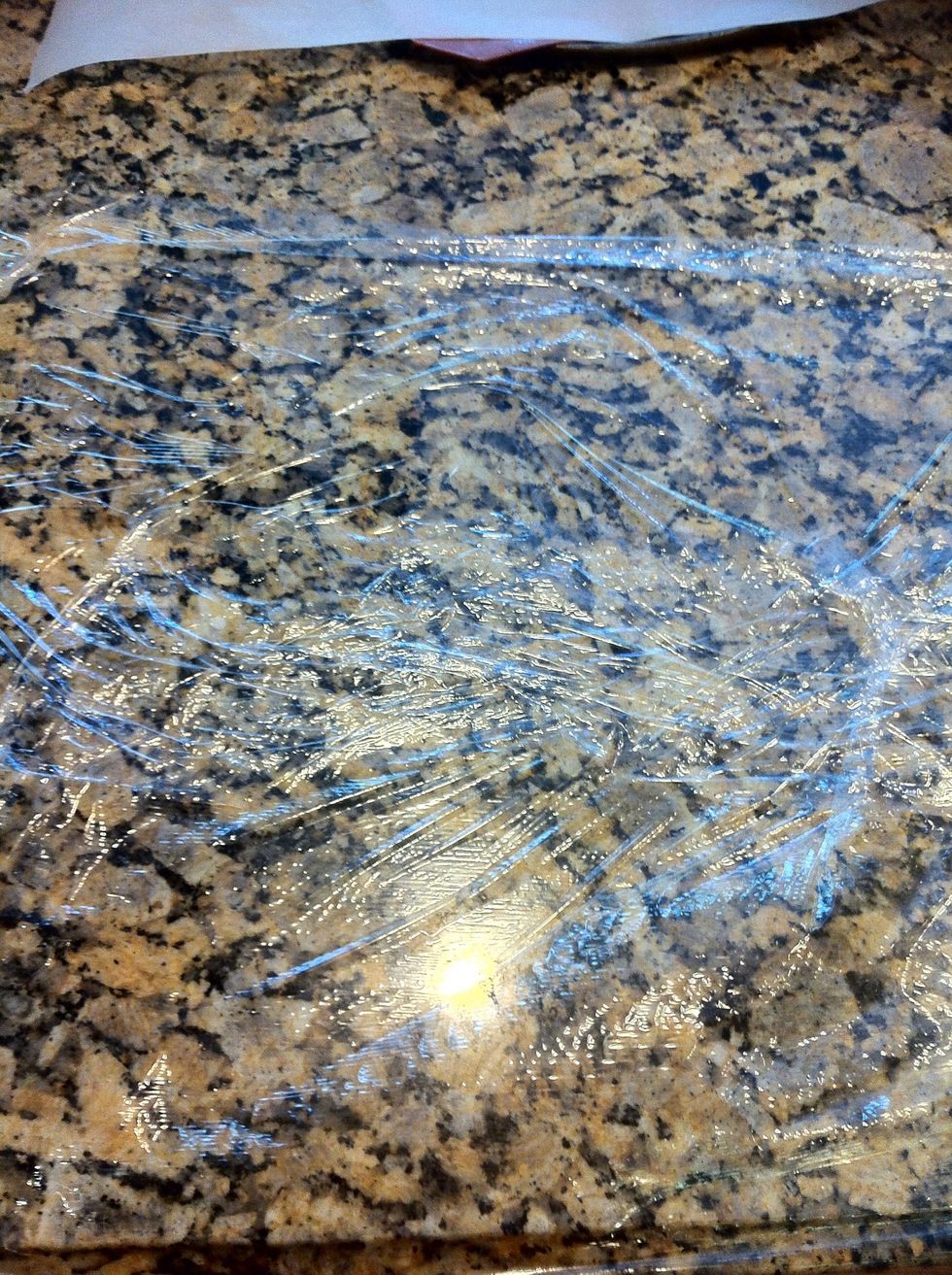 Lay down 2 pieces of plastic wrap (over lap the two pieces)