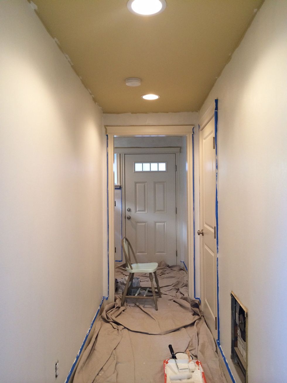 Lay down a drop cloth, tape off your trim, and start painting! We painted two coats for a nice finish. With Glidden Duo, there is no need to prime first!