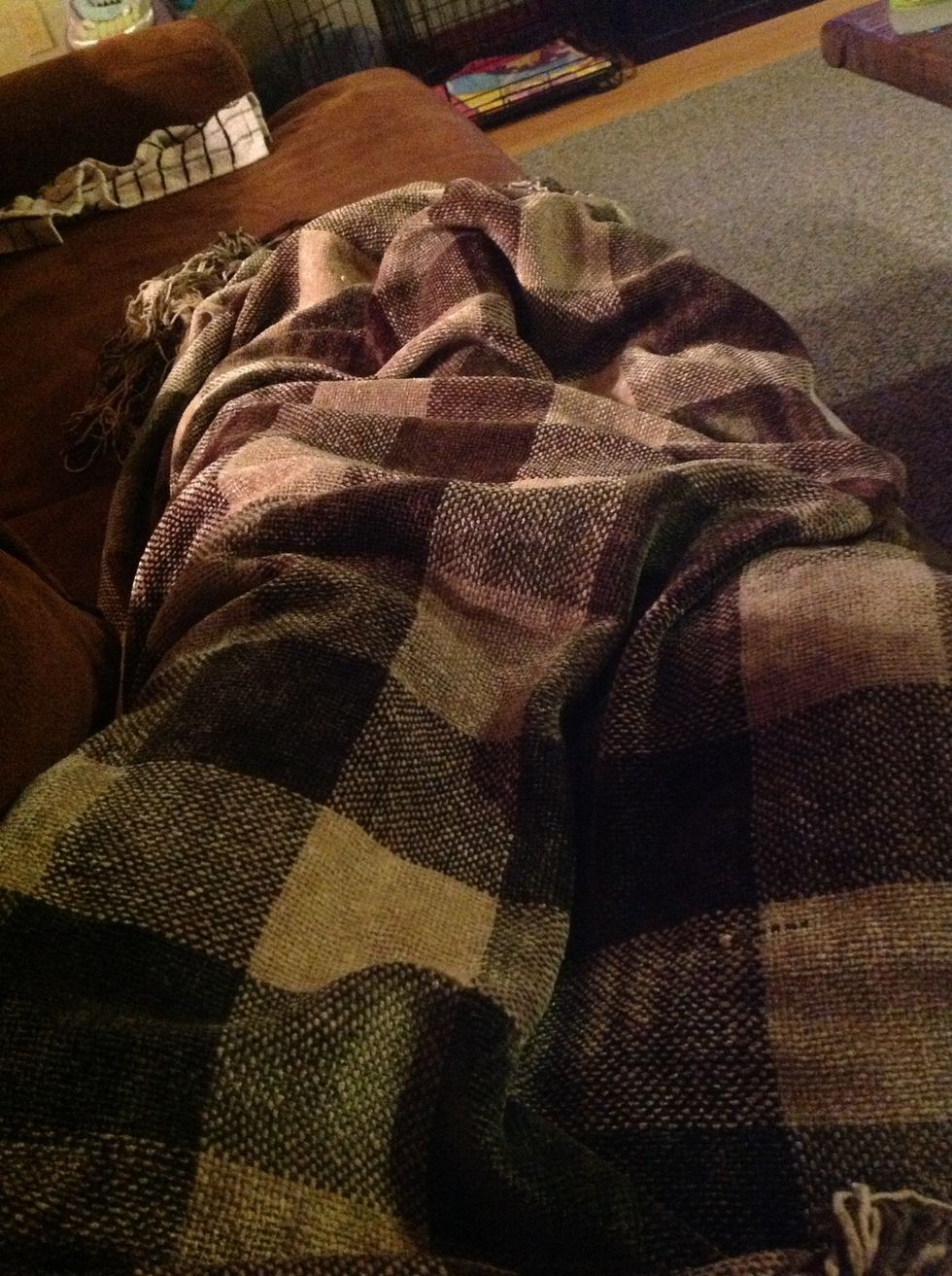 Lay down and put a blanket on