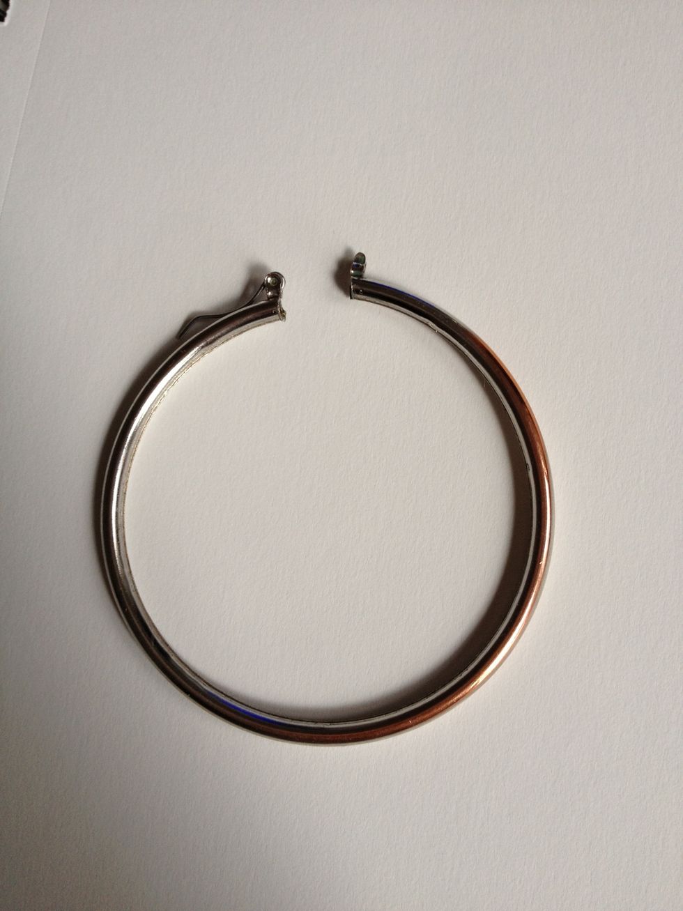 Lay earring on paper