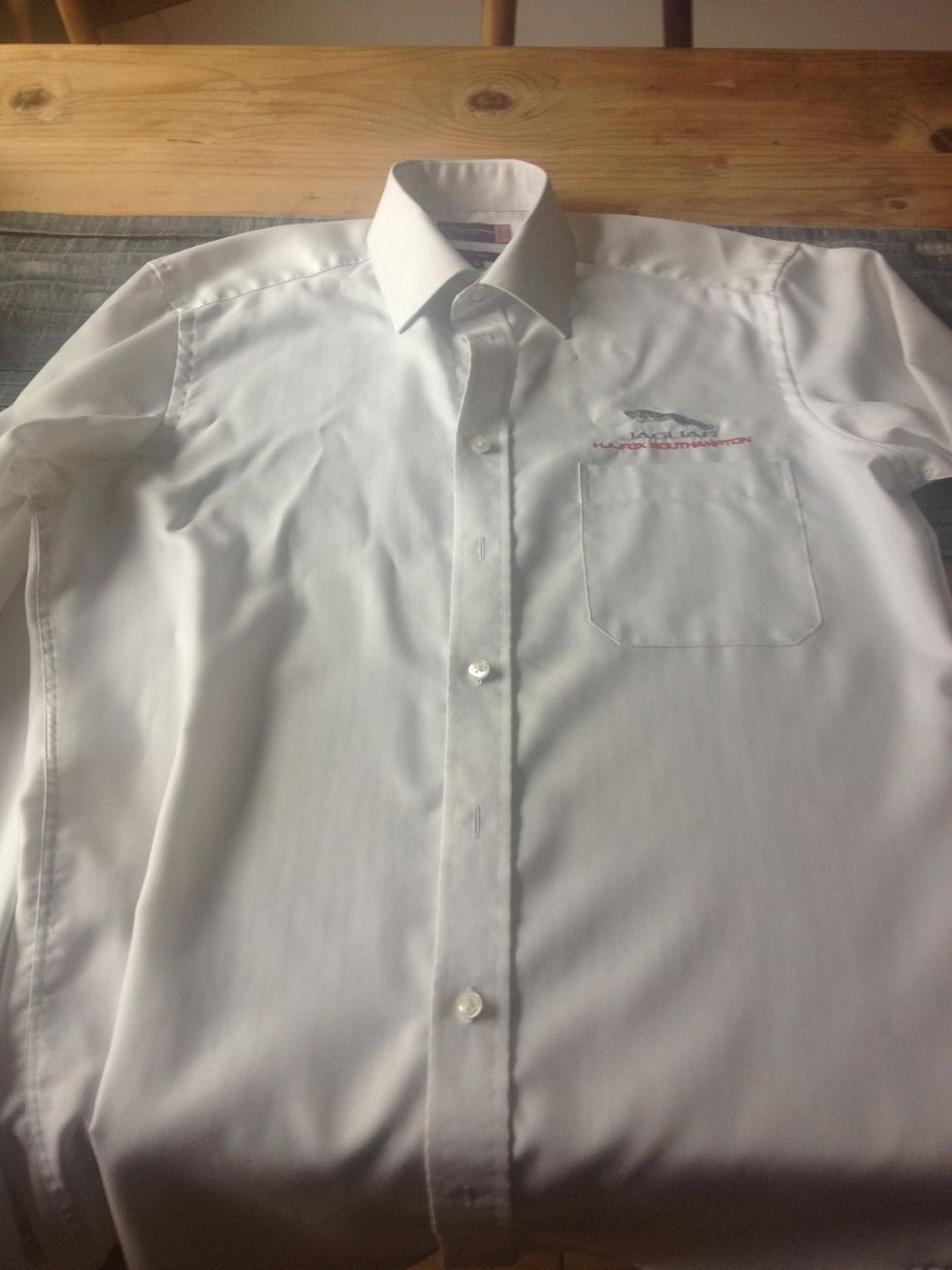 Lay flat start with top button and do up every other button.