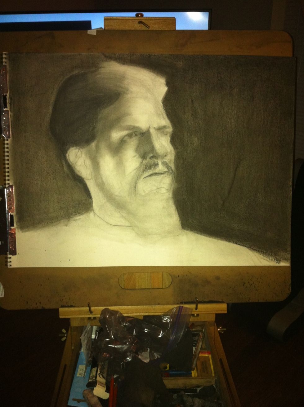 Lay in a background value in order to set a gauge for the remainder of the drawing. You typically want the background to be dark but not the darkest in your rendering. Follow up with shadow shapes.