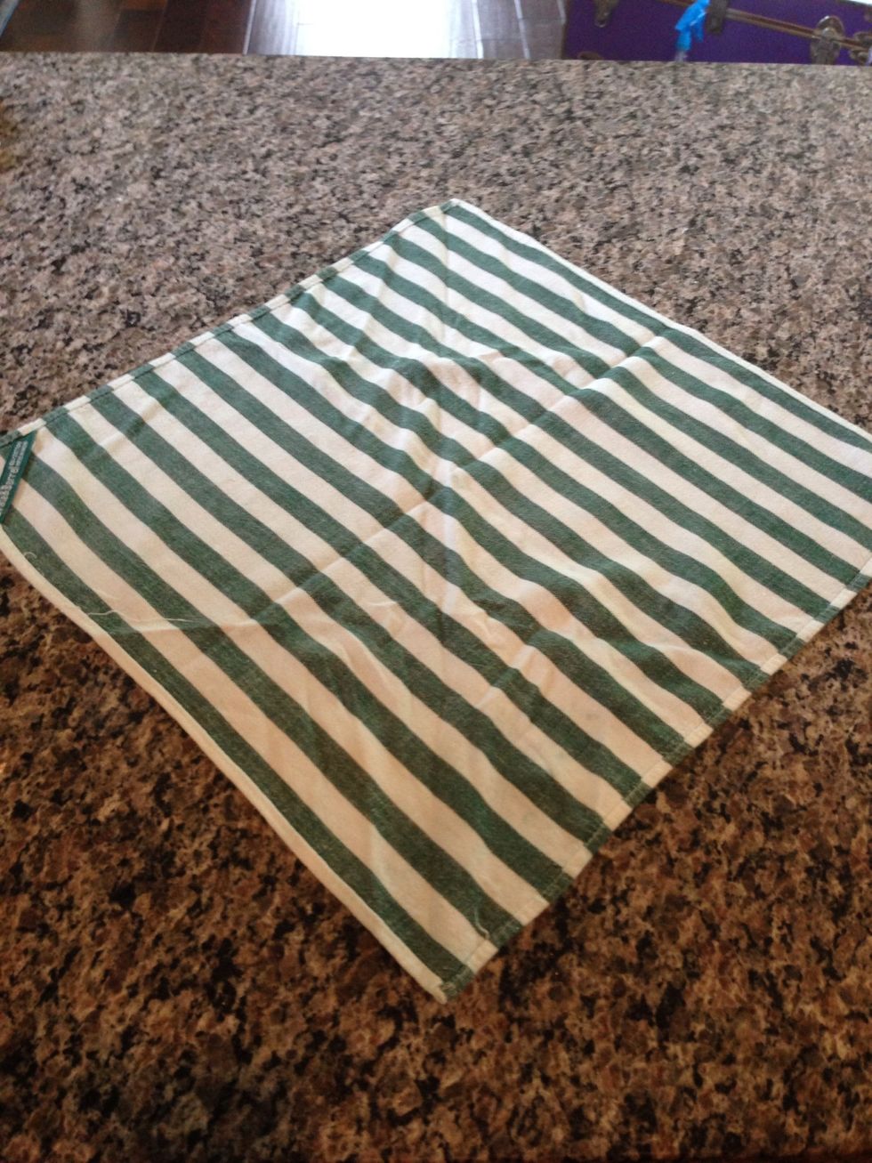 Lay napkin out seams up... Points up and down.  I found these striped little darlings at the thrift store. 75 cents. It was a delightful day.