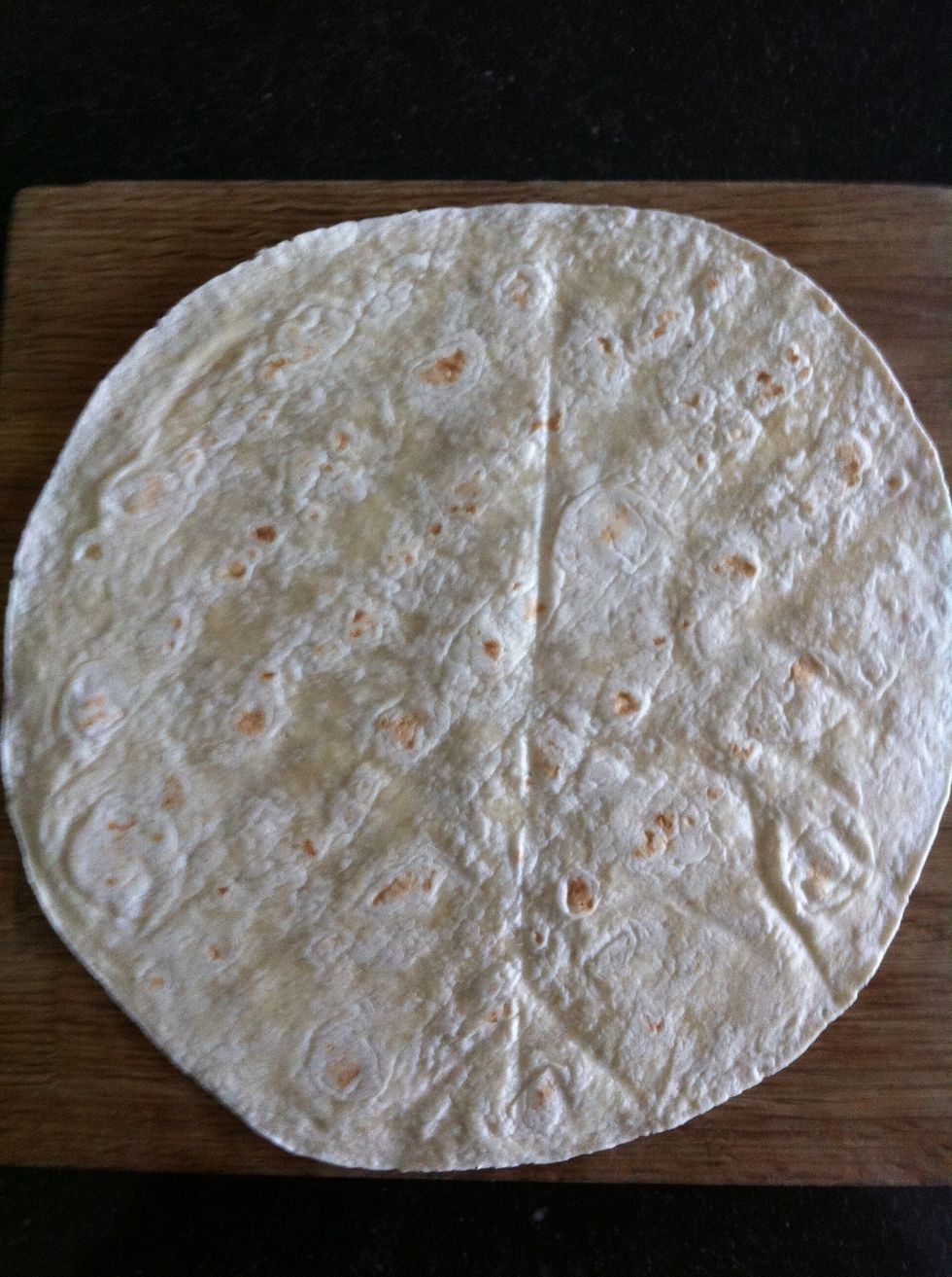 Lay one wrap on a flat surface.