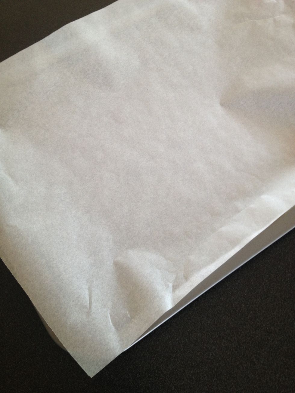 lay out a baking tray with baking paper