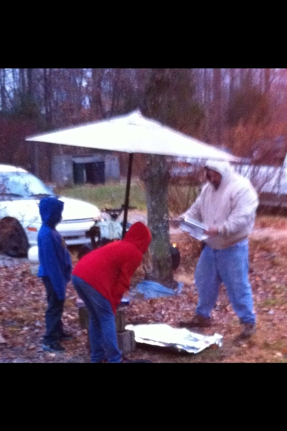 Lay out Aluminum Foil on the ground overlapping for a clean surface area.