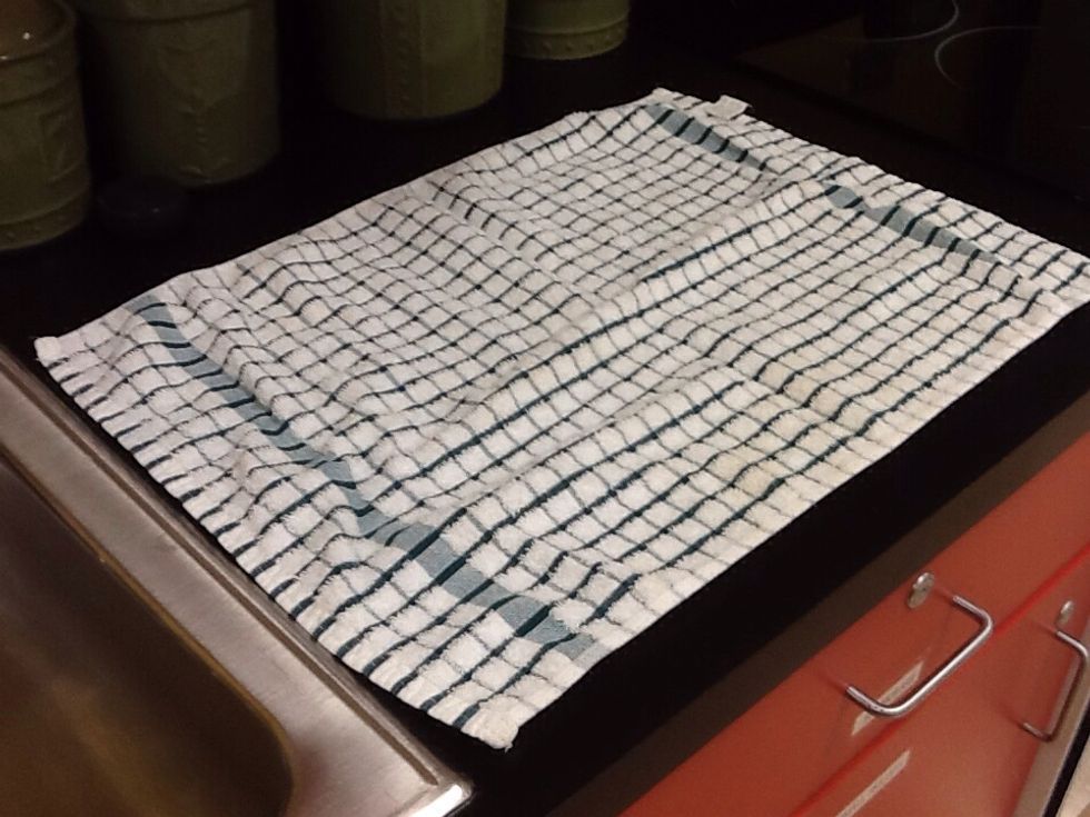 Lay out one towel on right side of sinks for drip dry.