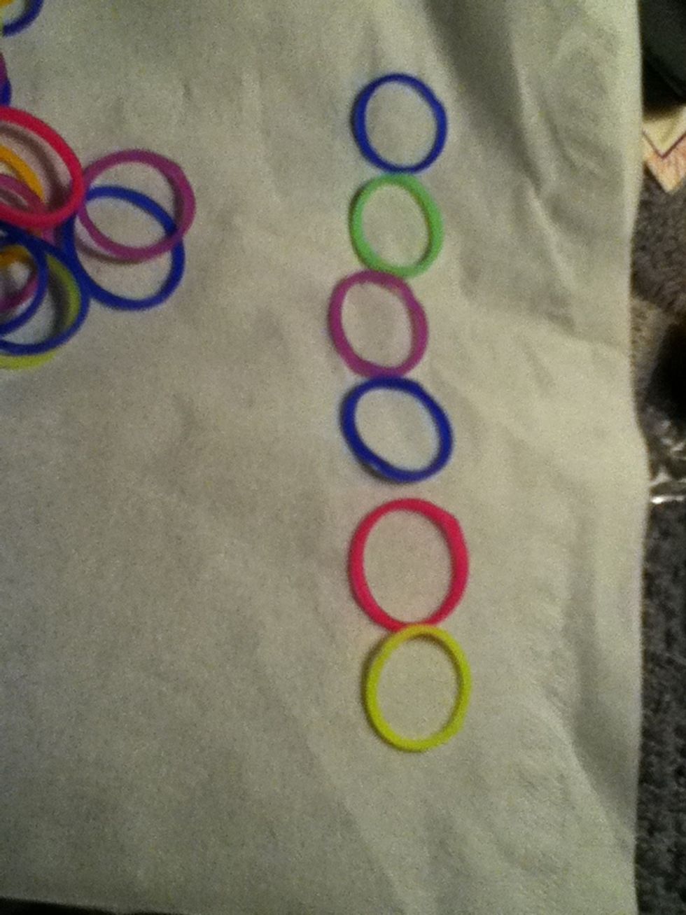 Lay out the loom colors you would like it takes about 22 Looms depending on how big your head is.