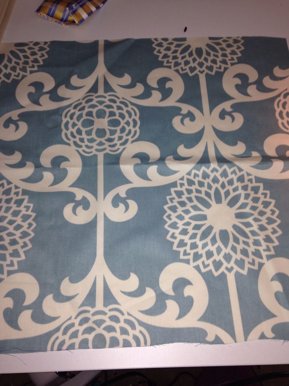 Lay out your big piece of fabric.