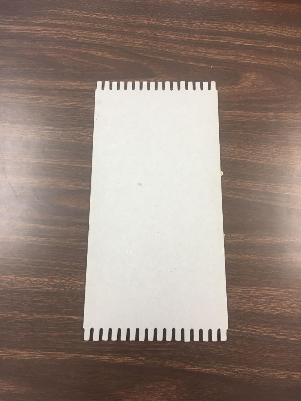 Lay out your card board Weaving Board.