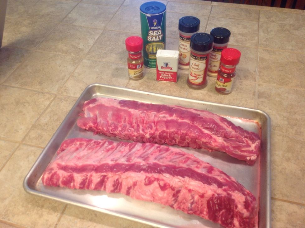 Lay out your pork ribs and the spices for your rub.
