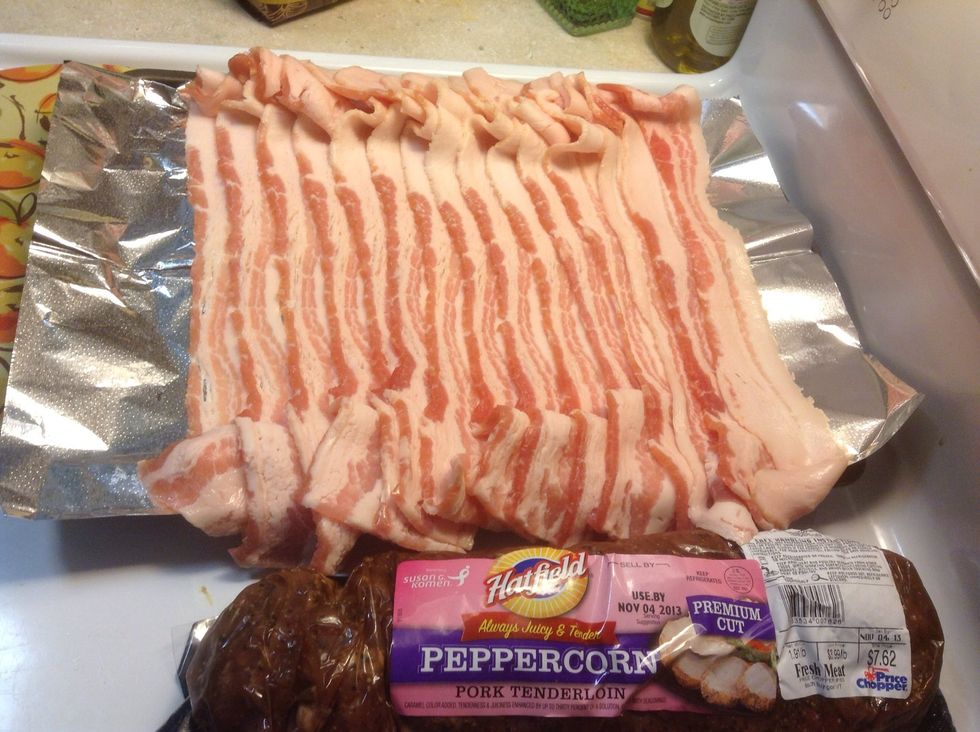 Lay the bacon out flat on sheet pan, on top of the foil, 1 on top of the other by a 1/4 of the slice