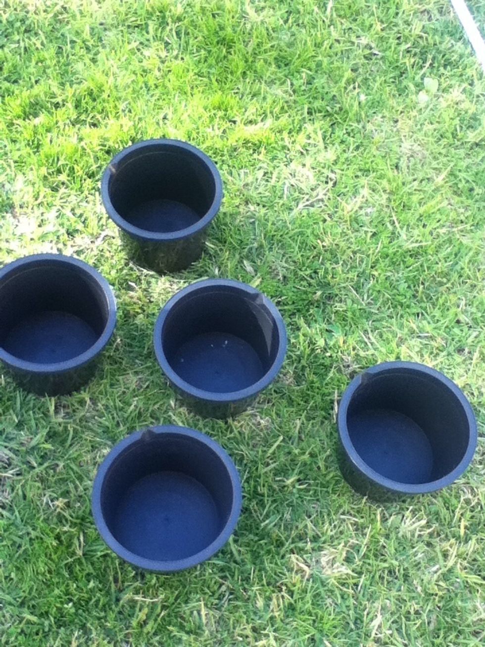 Lay the buckets out ready to put the poles and cement in.