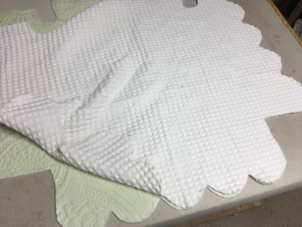 Lay the contrast layer on top, aligning all the edges and smoothing everything out evenly.