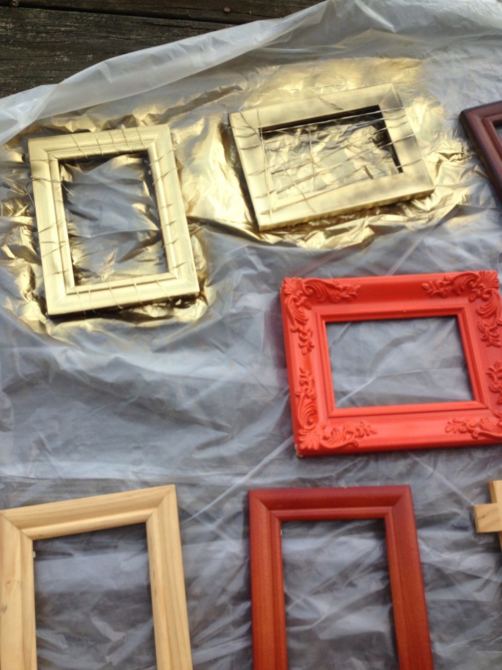 Lay the frames down on top of plastic bag - preferably outdoors - and spray away as much or as little color you want
