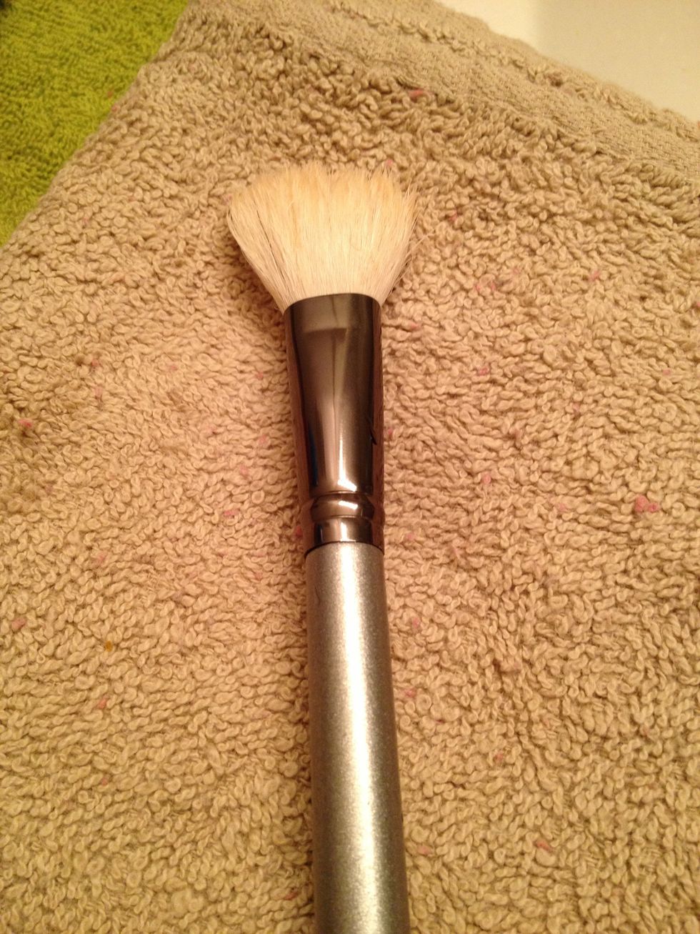 Lay the makeup brush FLAT on a small clean hand towel on the opposite side of the sink.  Continue cleaning the rest of your makeup brushes.