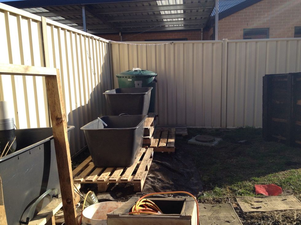 Lay the pallets to give the hight dimensions and "dry fit" the tanks/ponds till you are happy