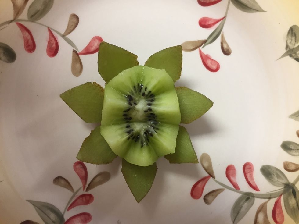 Lay the skin peel down so that it looks like a flower.