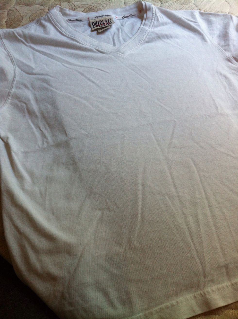 Lay the t-shirt of your choice flat *This one is thrifted! :-)*