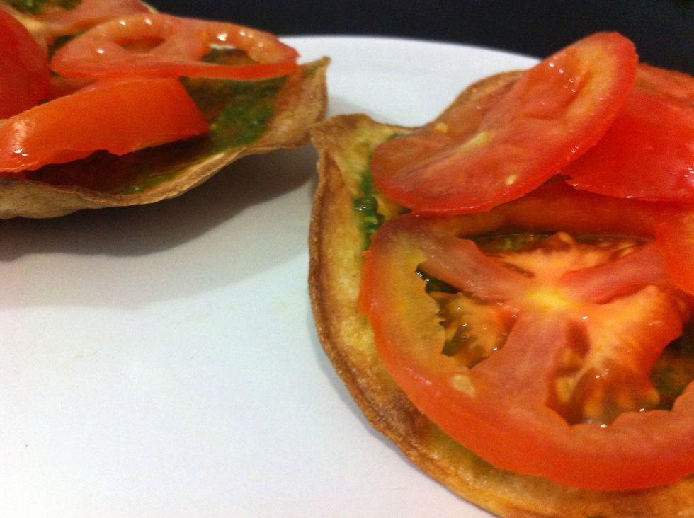 Lay tomato out to cover tortilla