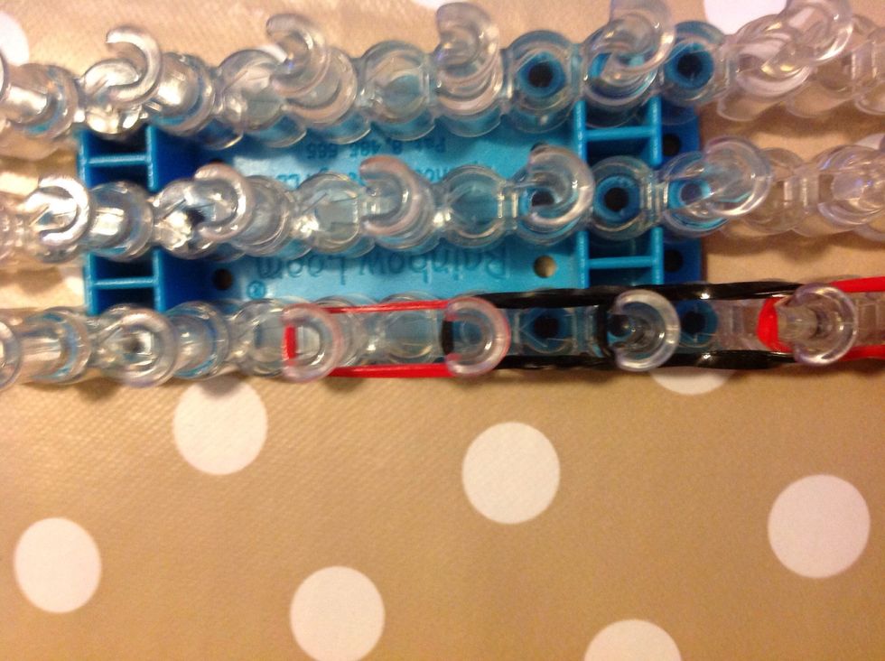 Lay two red bands like this.