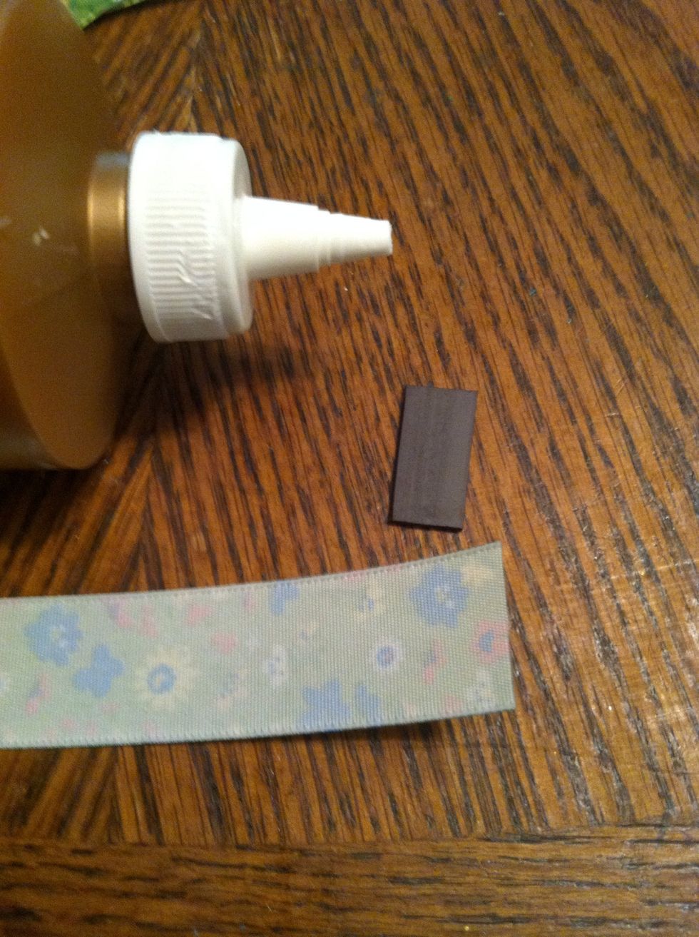 Lay you ribbon face down abs get a magnet and glue ready. If you have one sided magnets, make sure you glue magnet side down.