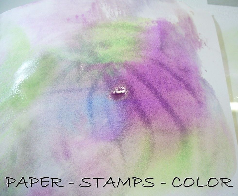 Lay your cardstock in the ink, and turn it around in the ink, about 90 degrees. Leave to dry.