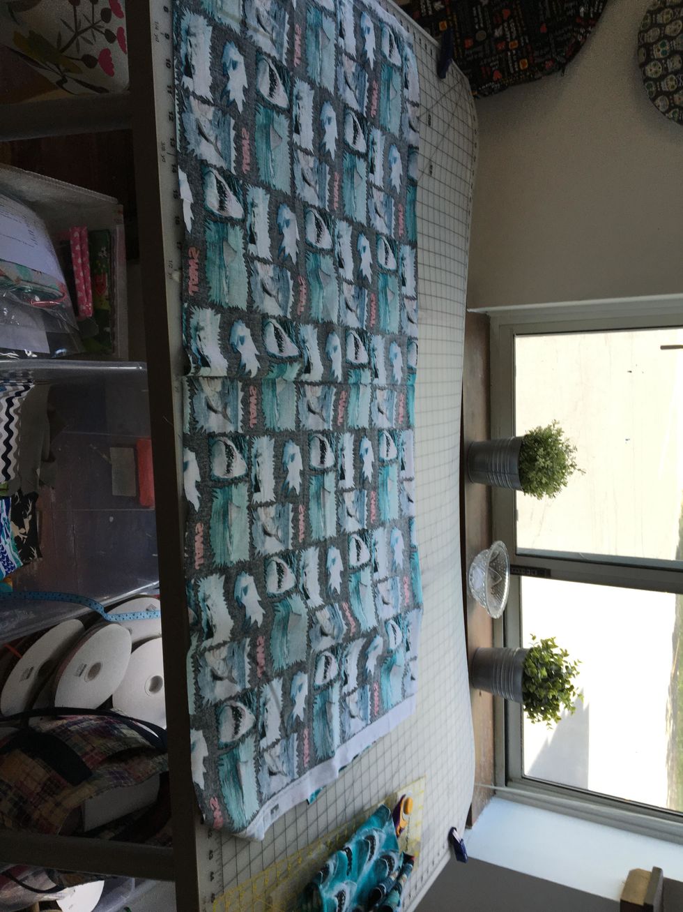 Lay your main body fabric right sides together with the band fabric, matching the top edges. Don't worry about the sides matching up.