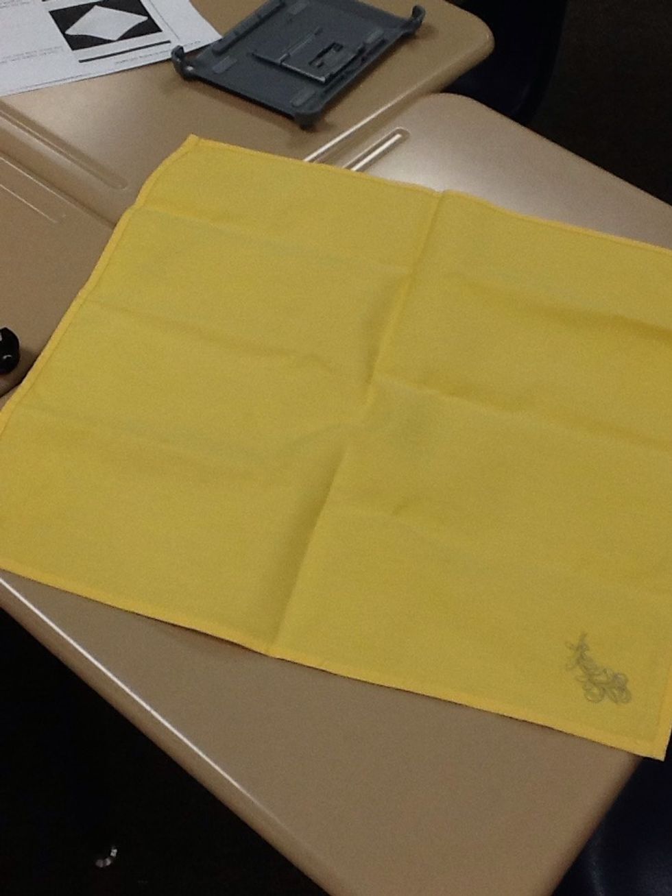 Lay your napkin flat on the table.