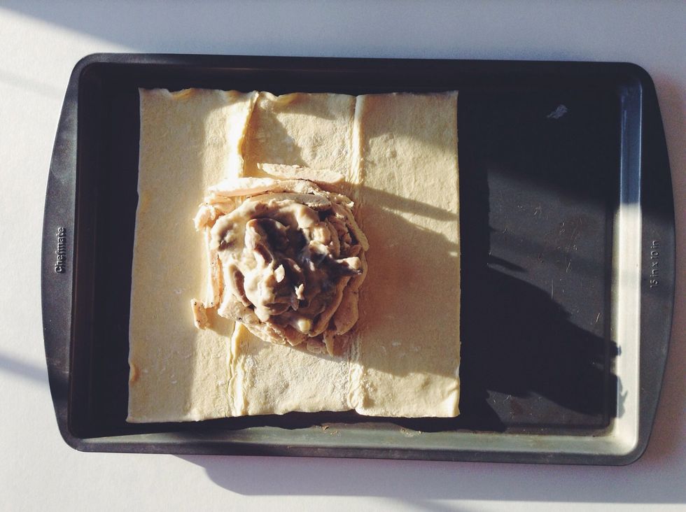 Lay your phyllo dough on a lightly greased sheet pan and in the center add as much or as little chicken as you'd like but try to keep it all in the center. Top with mushroom, about 1/2 cup.