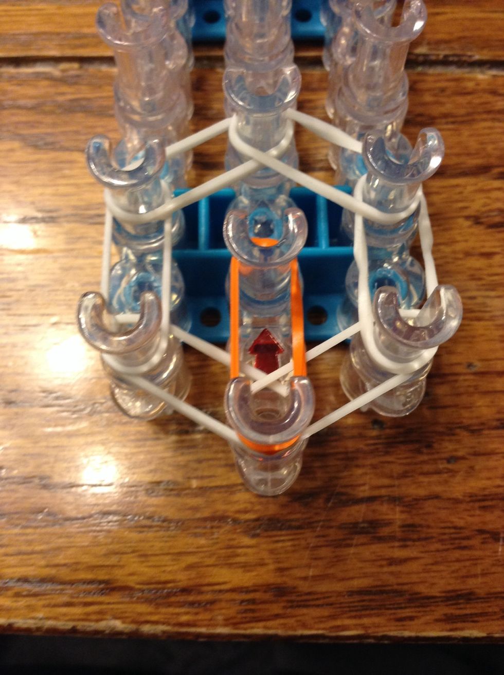 Lay your second color band on the loom as shown.