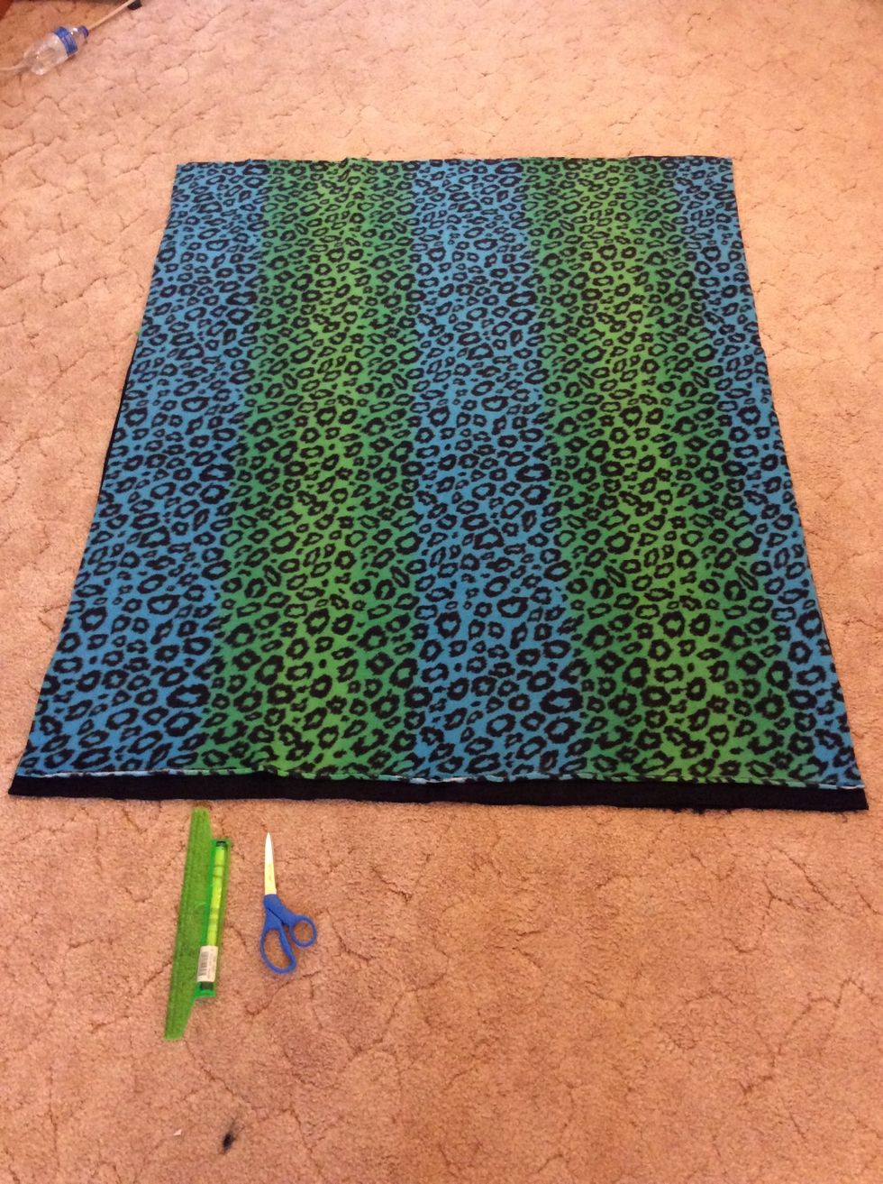 Lay your two fabrics down. Have the softer or more vibrant side facing up. For the bottom piece place the softer or more vibrant side down facing the ground.