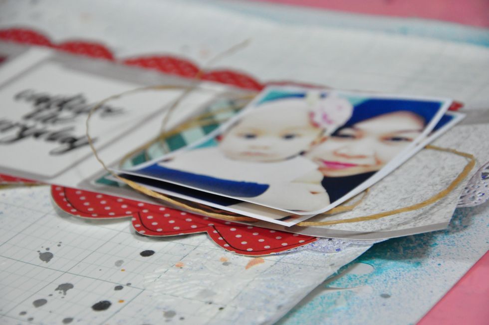 Layer a couple of photos and put it on top of a hemp or twine or thread. Then embellish the rest of your page
