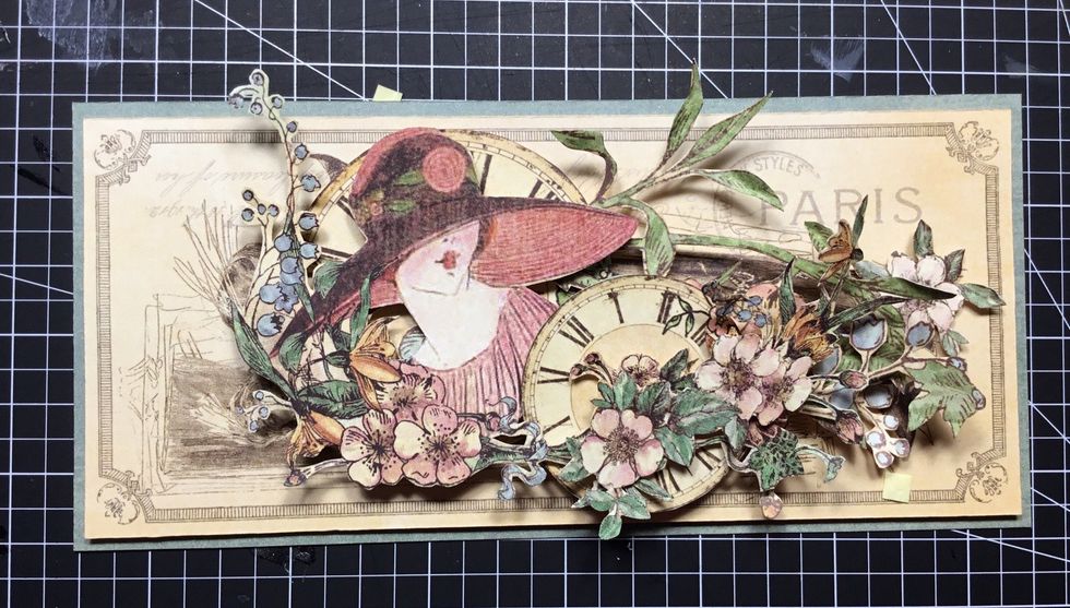 Layer additional fussy cut flowers as shown.