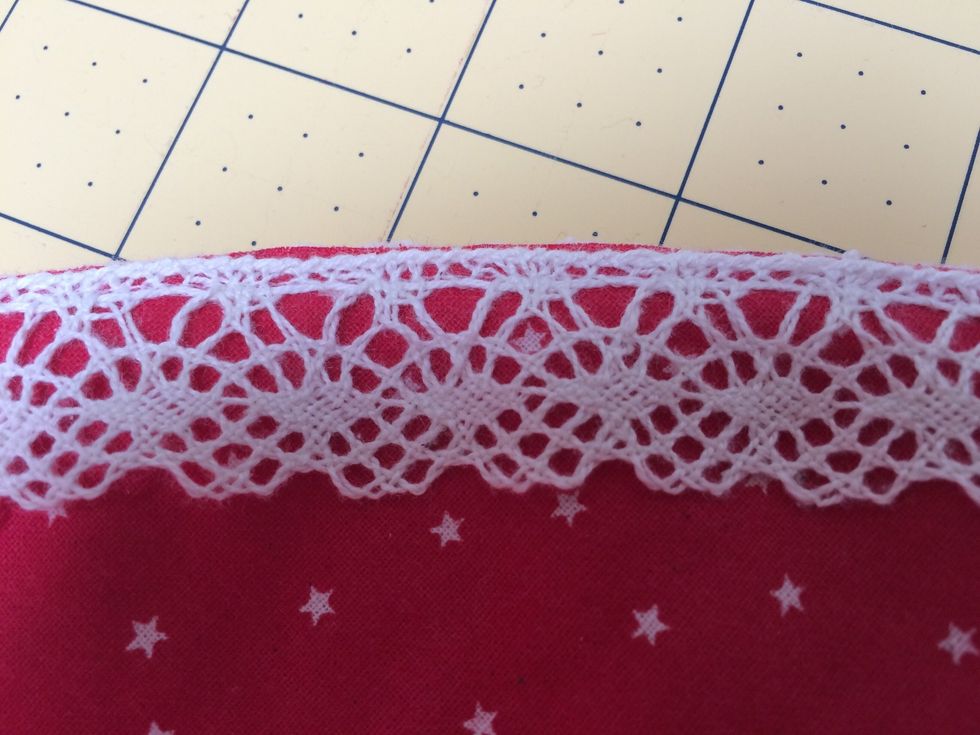 Layer and pin batting and main fabric pieces. Pin and sew lace around outer edge as close the edge as you can