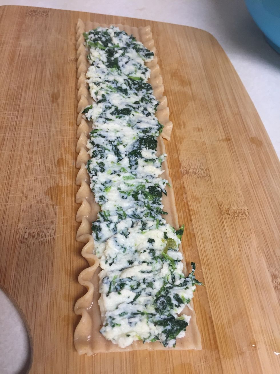 Layer cheese mixture all the way along noodle