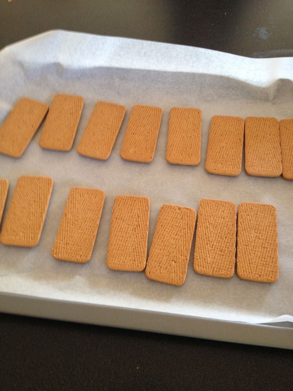 layer half of the biscuits out face down on the tray