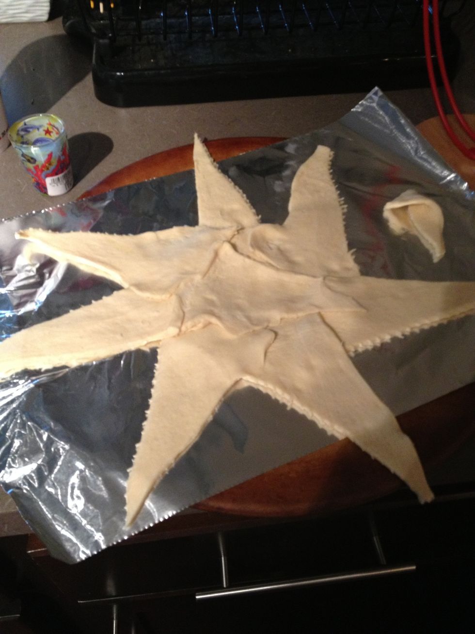 Layer in bacon, eggs, and shredded cheese